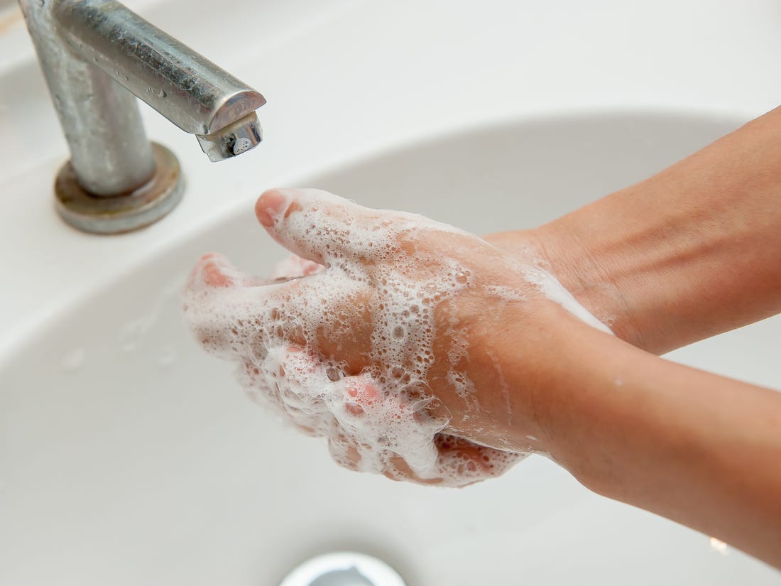 Wash hand using soap or sanitizer
